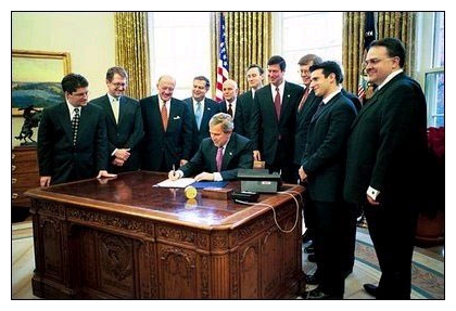 President Bush signing the 21st Century Nanotechnology Research and Development Act on December 3, 2003. In attendance at the signing were President Bush, Founders of NanoBCA, and NanoBCA Advisory Board Members.